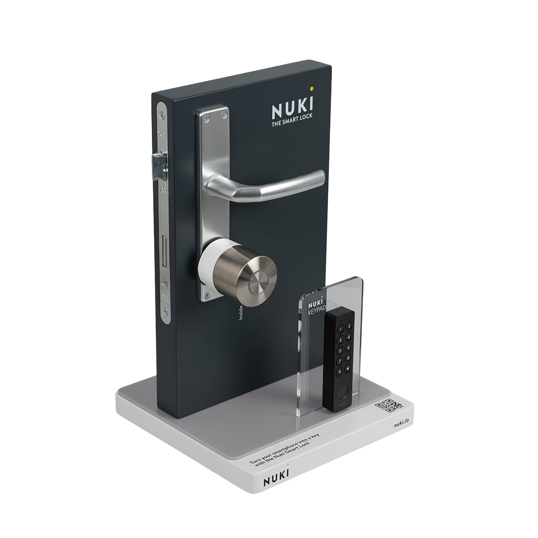 Nuki smart lock installed on door with keypad